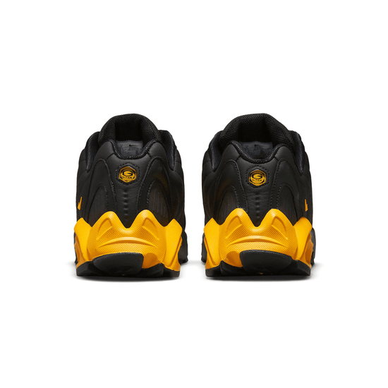 NOCTA x Nike Hot Step Air Terra 'Black University Gold'